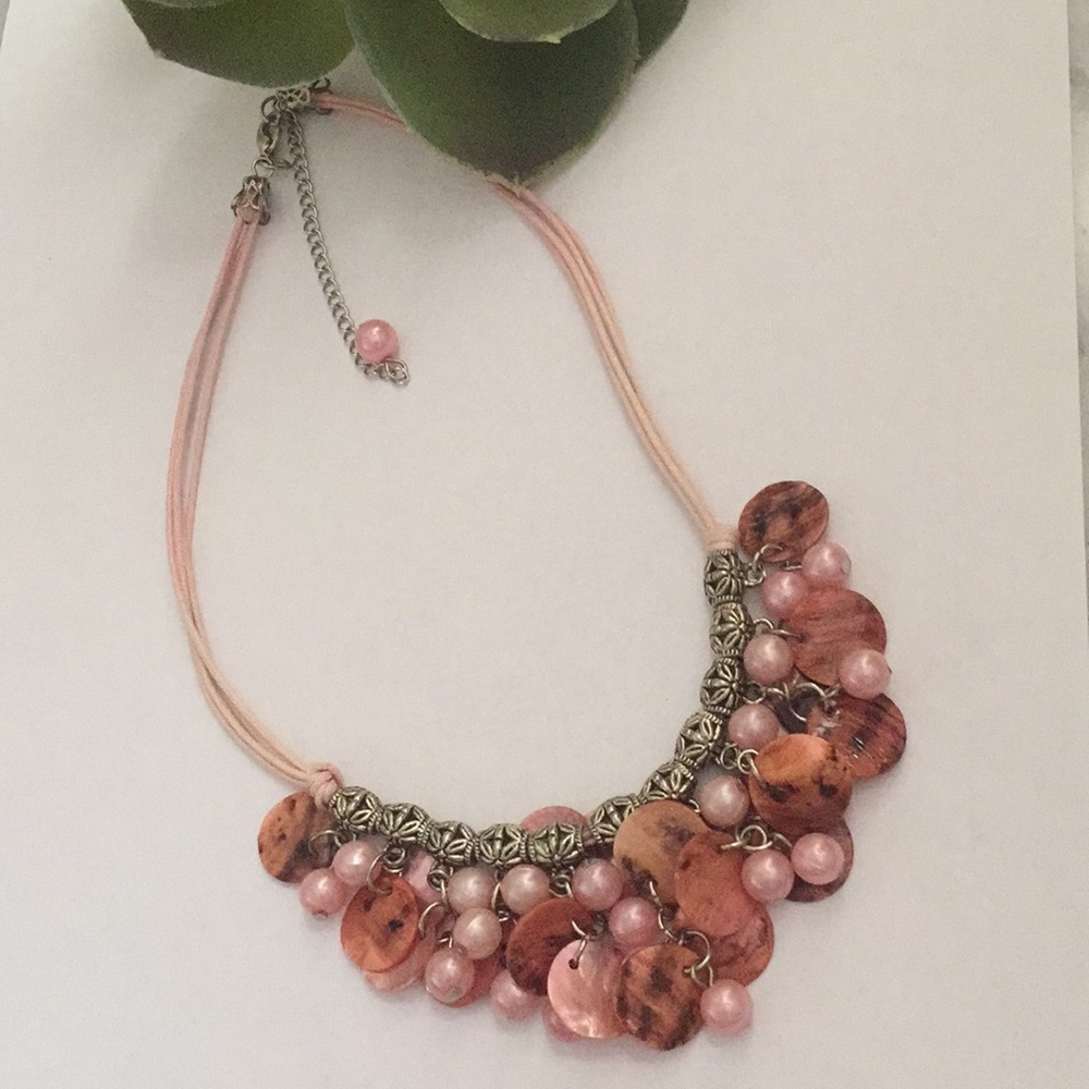 Pink, silver beaded shells necklace.